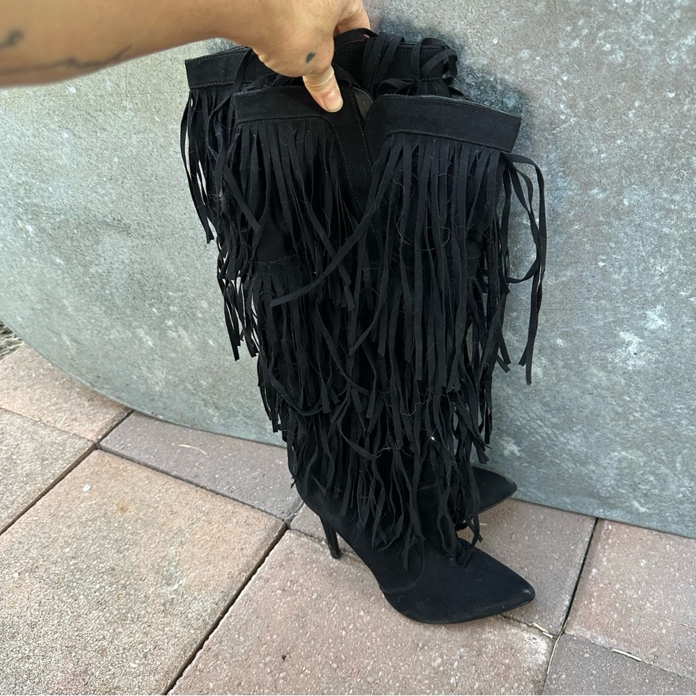 Knee high fringe heel boots